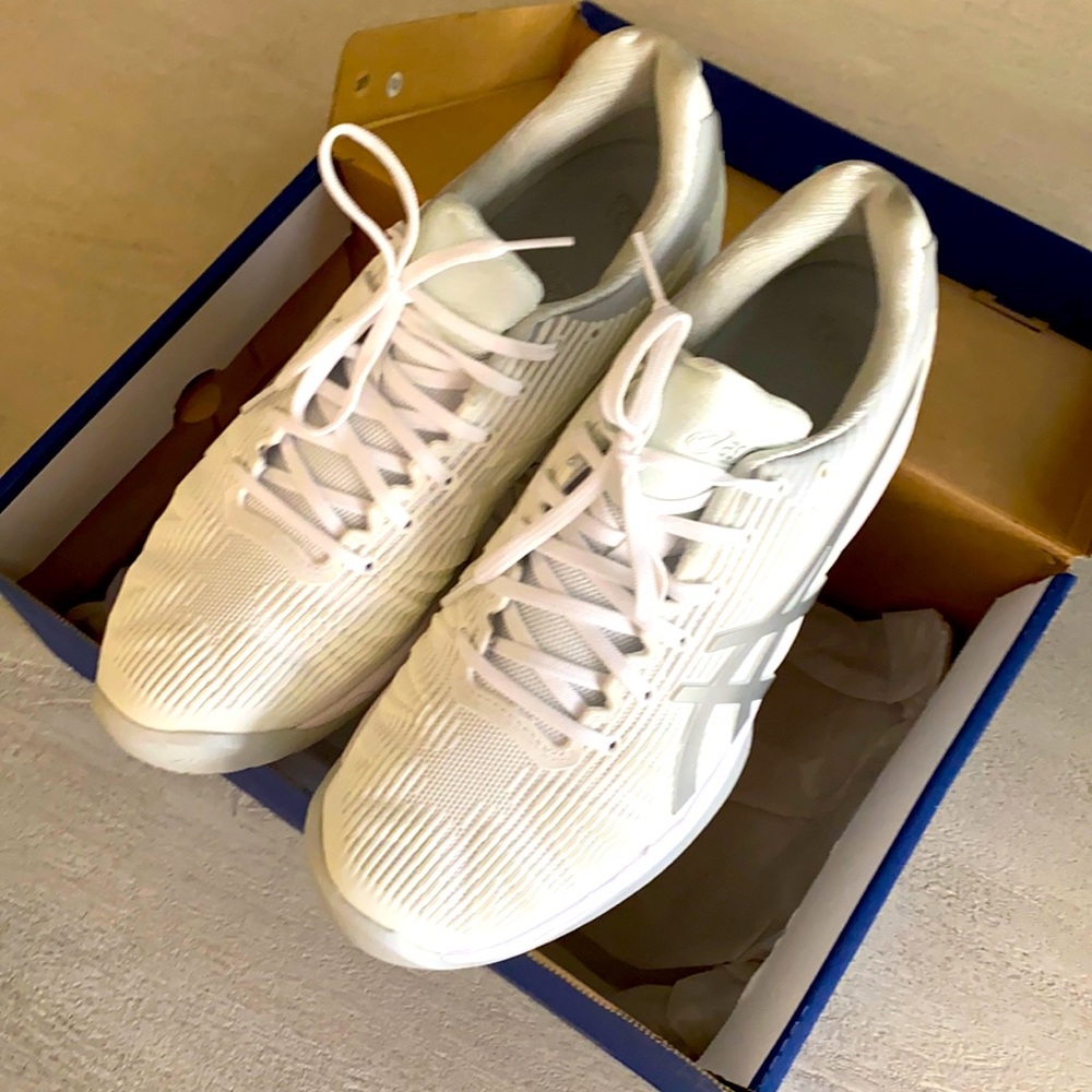 ASICS tennis shoes. Never worn.